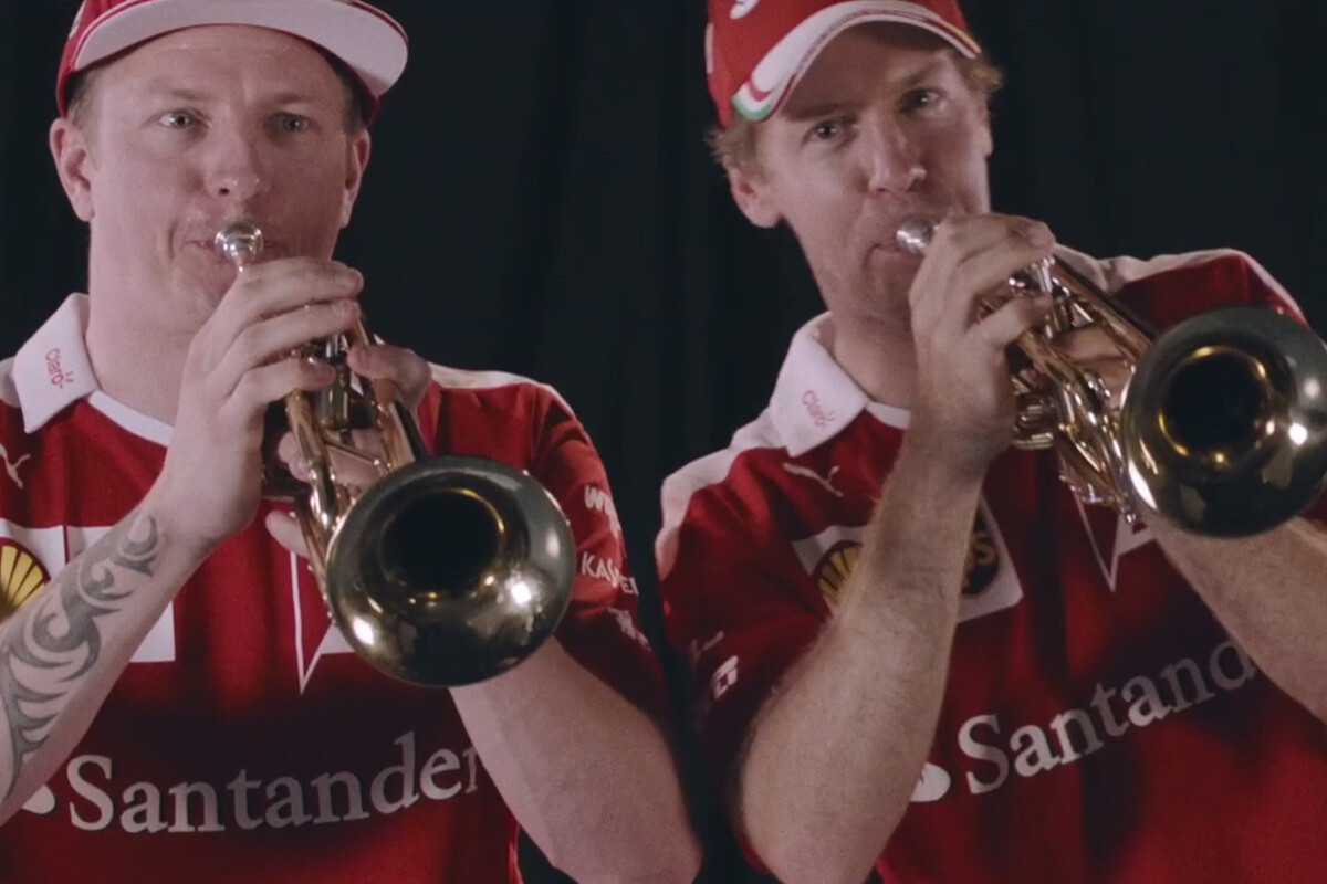 Kimi Raikkonen y Sebastian Vettel con trompetas